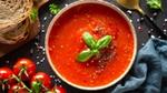 Bowl of soup with Tomatoes and bread