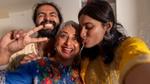 Three people of same family smiling